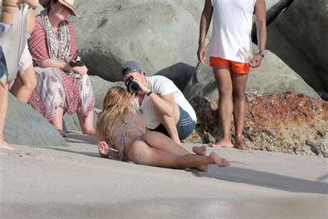 Candice Swanepoel Writhes Around In Tiny Bikini In