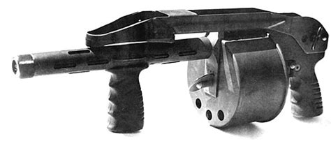 original striker shotgun   inches barrel note  winding key   front