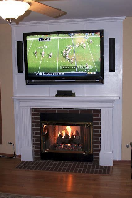 mounting  tv   fireplace  hiding  cords  creative inspiration