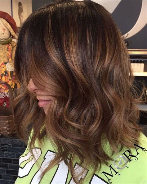 caramel highlights  women  flaunt  ultimate hairstyle