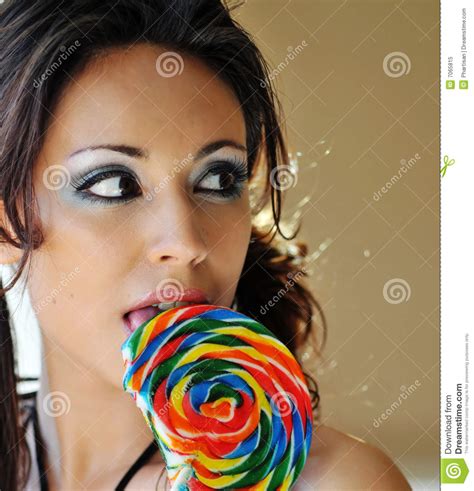 beautiful woman eating candy lollipop stock image image of eyes candy 7065815