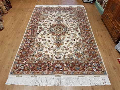 handgeknoopt perzisch tapijt tabriz met zijde id vintage perzische en oosterse