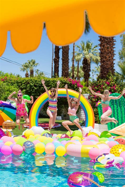 epic rainbow balloon pool party pool birthday party girls pool