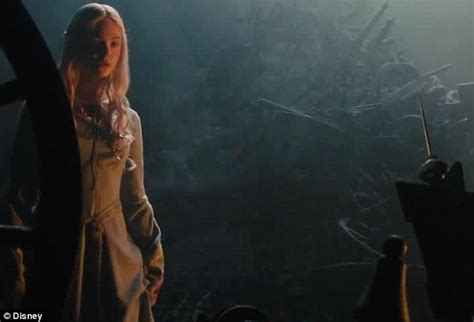 elle fanning recreates finger prick scene in new maleficent clip