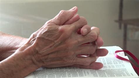 Old Lady Hands Holding A Catholic Rosary Or Cucifix And