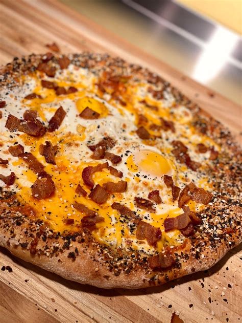 made a breakfast pizza bacon egg and cheese with everything crust r