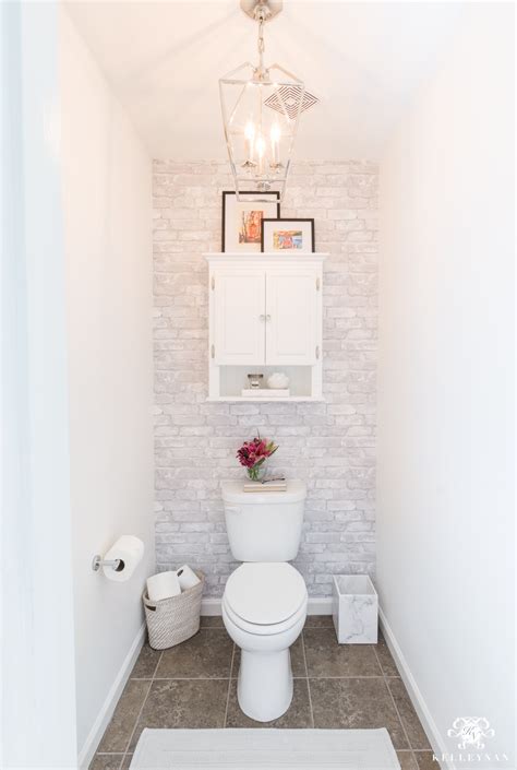 toilet room makeover reveal and clever bathroom storage kelley nan