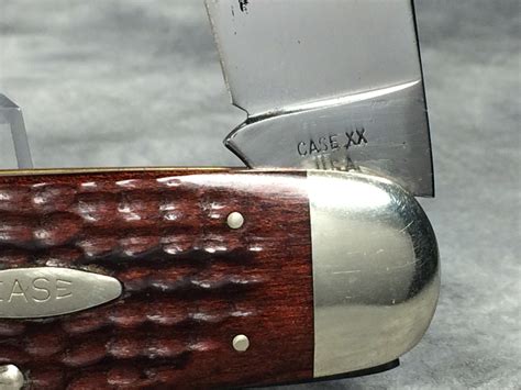 case xx usa  jigged pakkawood elephant toenail pocket knife worth