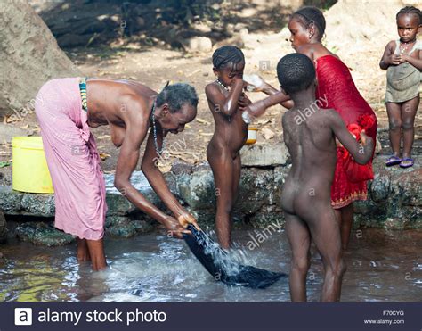 naked zulu girls river washing