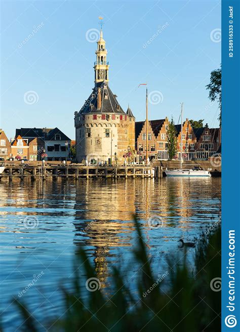 clock tower hoofdtoren  shore  markermeer lake netherlands stock image image