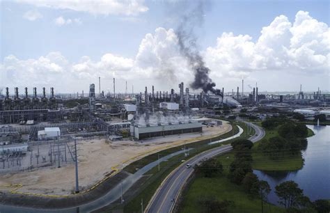 exxons baytown plant   reduced rates  fire