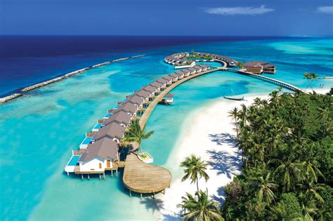 atmosphere kanifushi maldives unveils  overwater villas business hotelier india