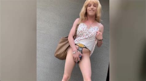 Public With Chastity Belt Tranny Pissing Through A Hose In Coffee In