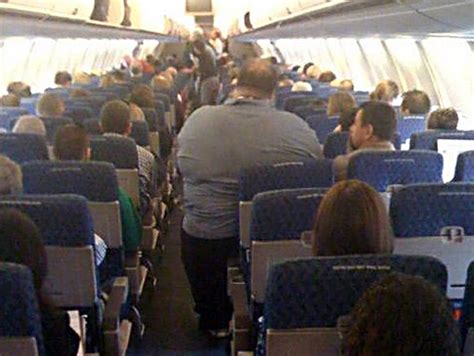 Too Fat To Fly Photo Showing Overweight Passenger Raises