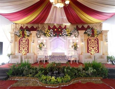 dekorasi pengantin ukir  tenda pernikahan perkawinan sederhana
