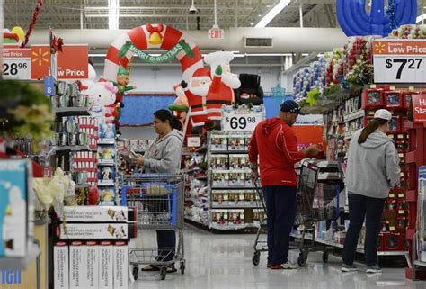 wal mart outlook hit by store closings food stamp cuts reuters