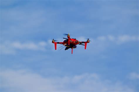 red drone flying   blue sky image  stock photo public domain photo cc images