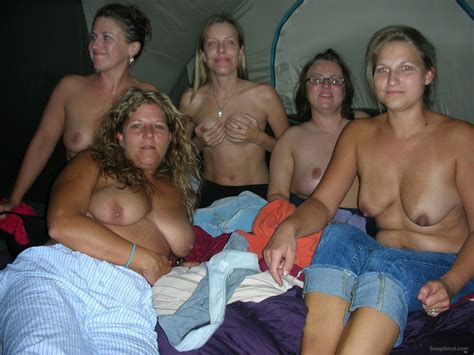 wife showing tits in a group of friends showing also