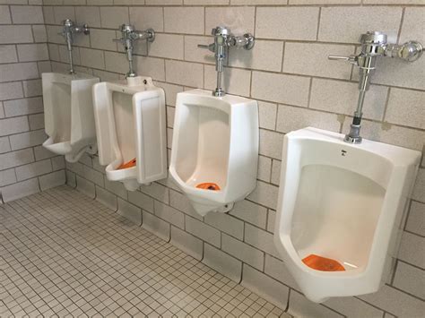 each urinal in this restroom has a different design mildlyinteresting