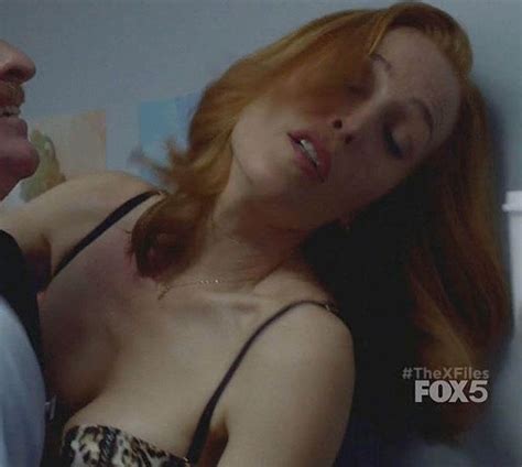 gillian anderson strips for the x files as she unbuttons her blouse in saucy scenes irish