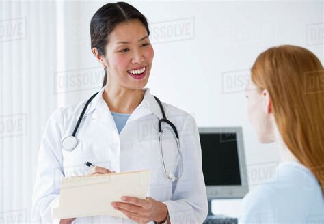 doctor talking  patient stock photo dissolve