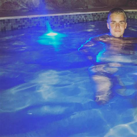 Justin Bieber Confuses Fans With Naked Skinny Dipping Pool Snap