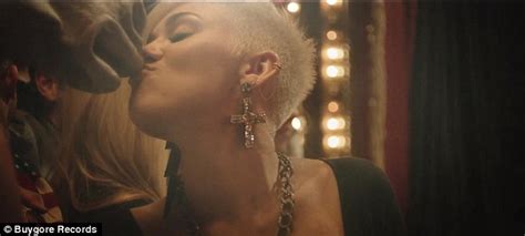 Miley Cyrus Tongue Kisses Fiancé Liam Hemsworth Who S