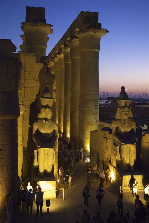 Luxor Temple At Night With Two Colossal Statues Of