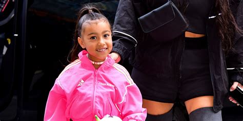 kuwk north west tries on mom kim kardashian s colorful heels in new