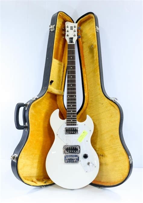 act electric white guitar  hard case kastner auctions