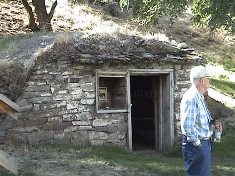 stone foundation   small shack building