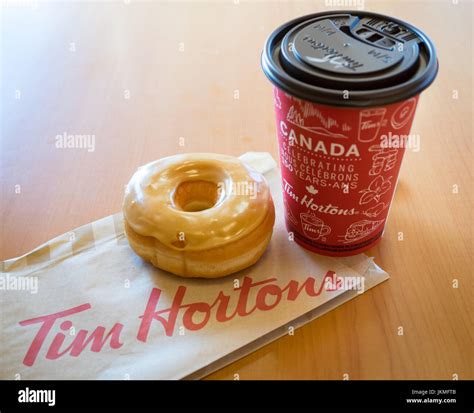 tim hortons maple dip donut  coffee stock photo alamy