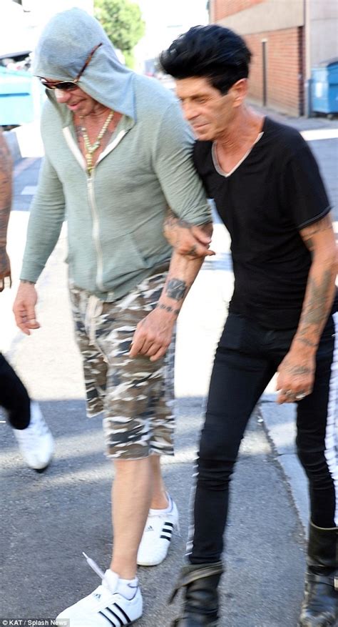 mickey rourke wears bandage as he dines with giuseppe franco in la