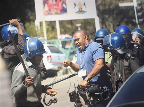 pictures of a bbc photo journalist attacked by zimbabwe police during