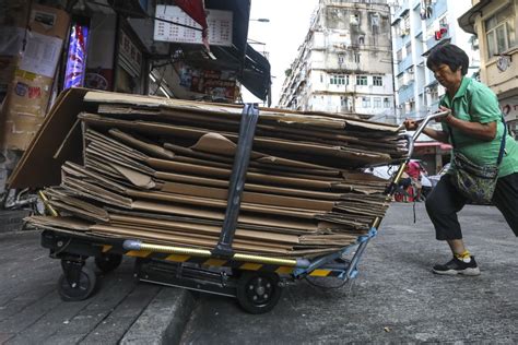 hong kong s ‘cardboard grannies get trolley upgrade after team from