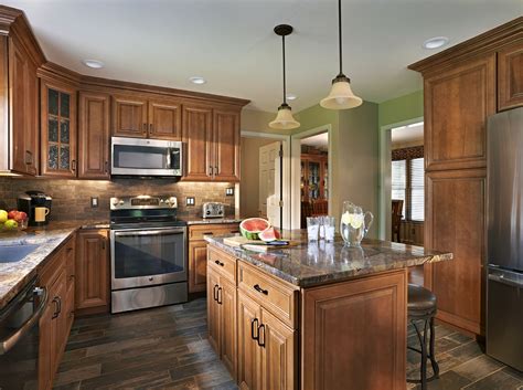warm cozy kitchen featuring wolf classic cabinets  hudson heritage