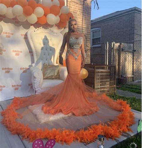 pin   prom slays long sleeve mermaid prom dress feather prom dress orange prom dresses