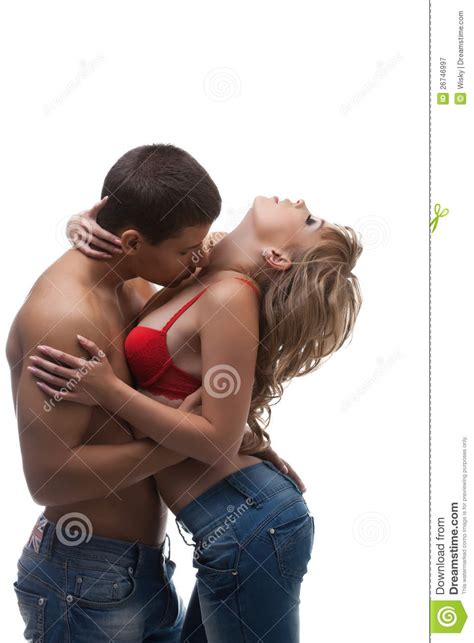 athletic beauty man kiss girl in red bra royalty free
