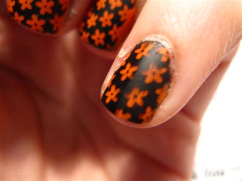 matte orange kewtified nails