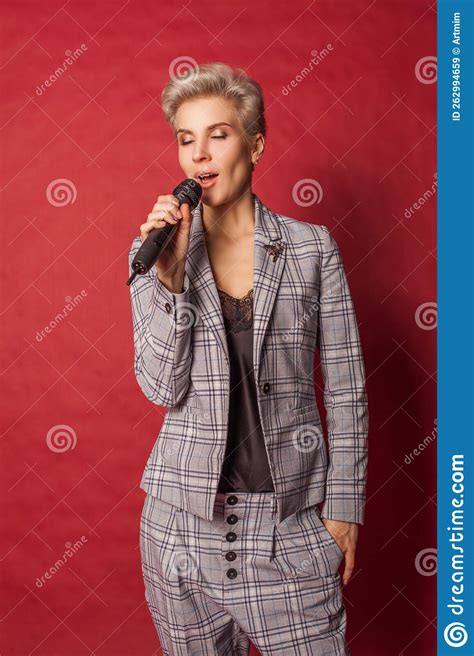 Beautiful Blonde Host Singer Blogger Woman In Suit Saying Something In