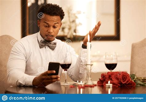 Confused Angry And Phone Fail Of A Date Of A Black Man Waiting At A