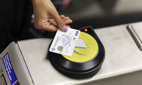 london tube introduces contactless payments money  guardian