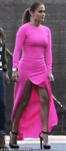 Jennifer Lopez Shows Off Her Toned Legs In A Hot Pink Skin Tight Dress