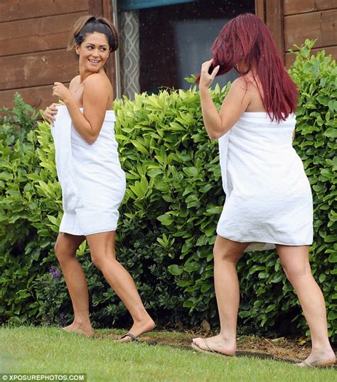 casey batchelor slips in to towel as she heads to hot tub
