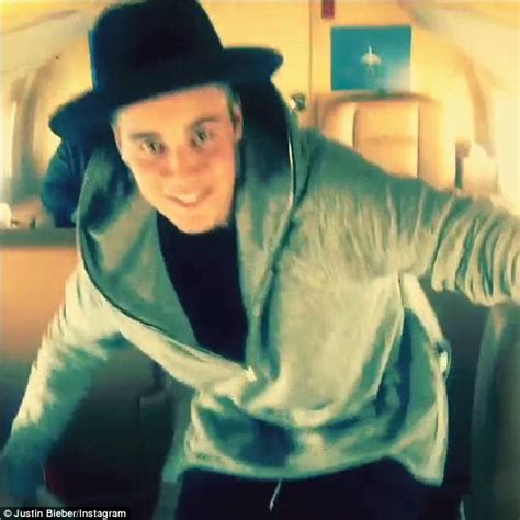 justin bieber assures fans he s not homosexual while kissing man s cheek daily mail online