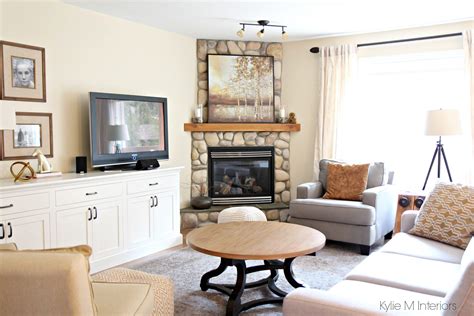south facing living room  stone corner fireplace furniture home