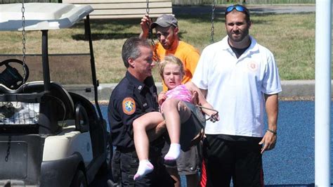 rescue workers help girl trapped in swing newsday