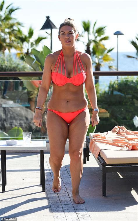 Frankie Essex Shows Off Her Curves In A Vibrant Coral Bikini As She
