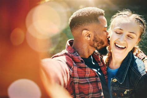 Selfie Kiss And Interracial Couple On A Date In Nature For Support