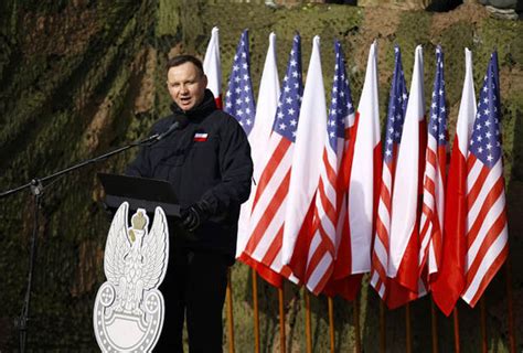 us soldiers in poland polish president welcomes nato